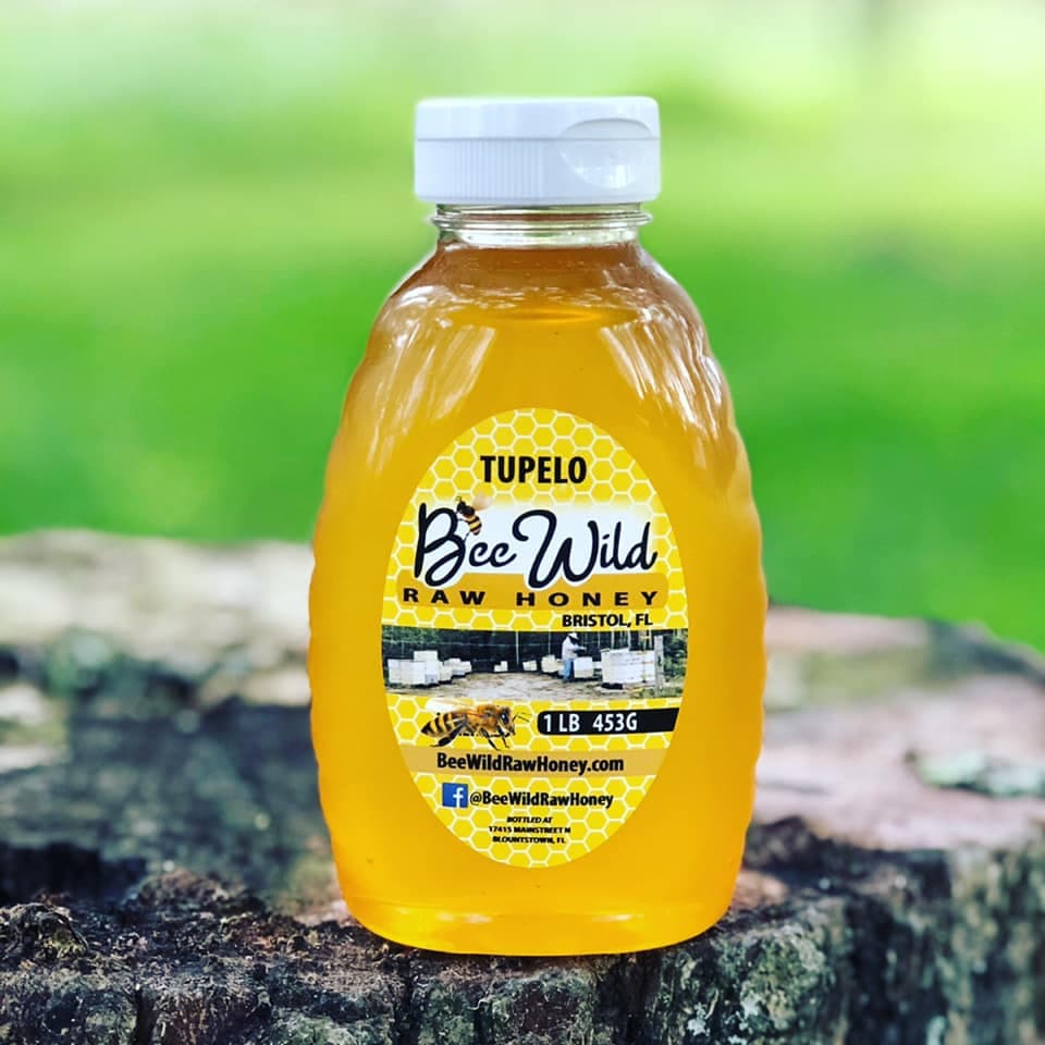 Bee Wild Raw Honey. Raw & Unfiltered Honey. photo 2